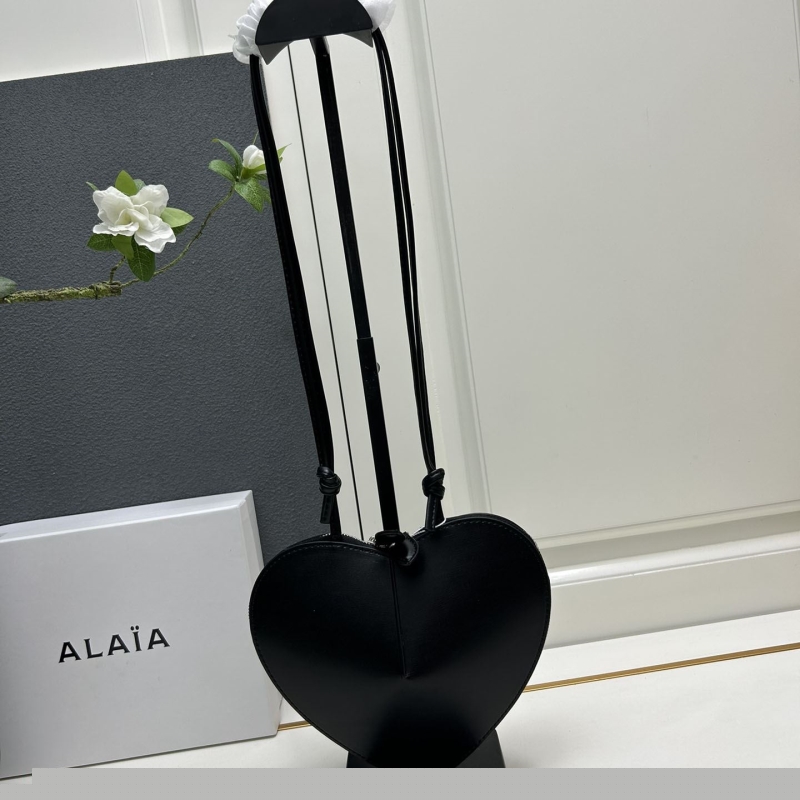 Alaia Round Bags